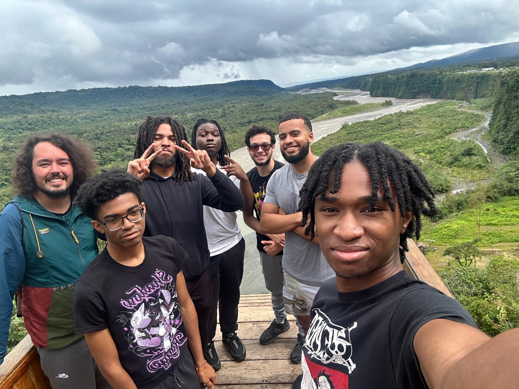 Peace by Piece group portrait over a river valley